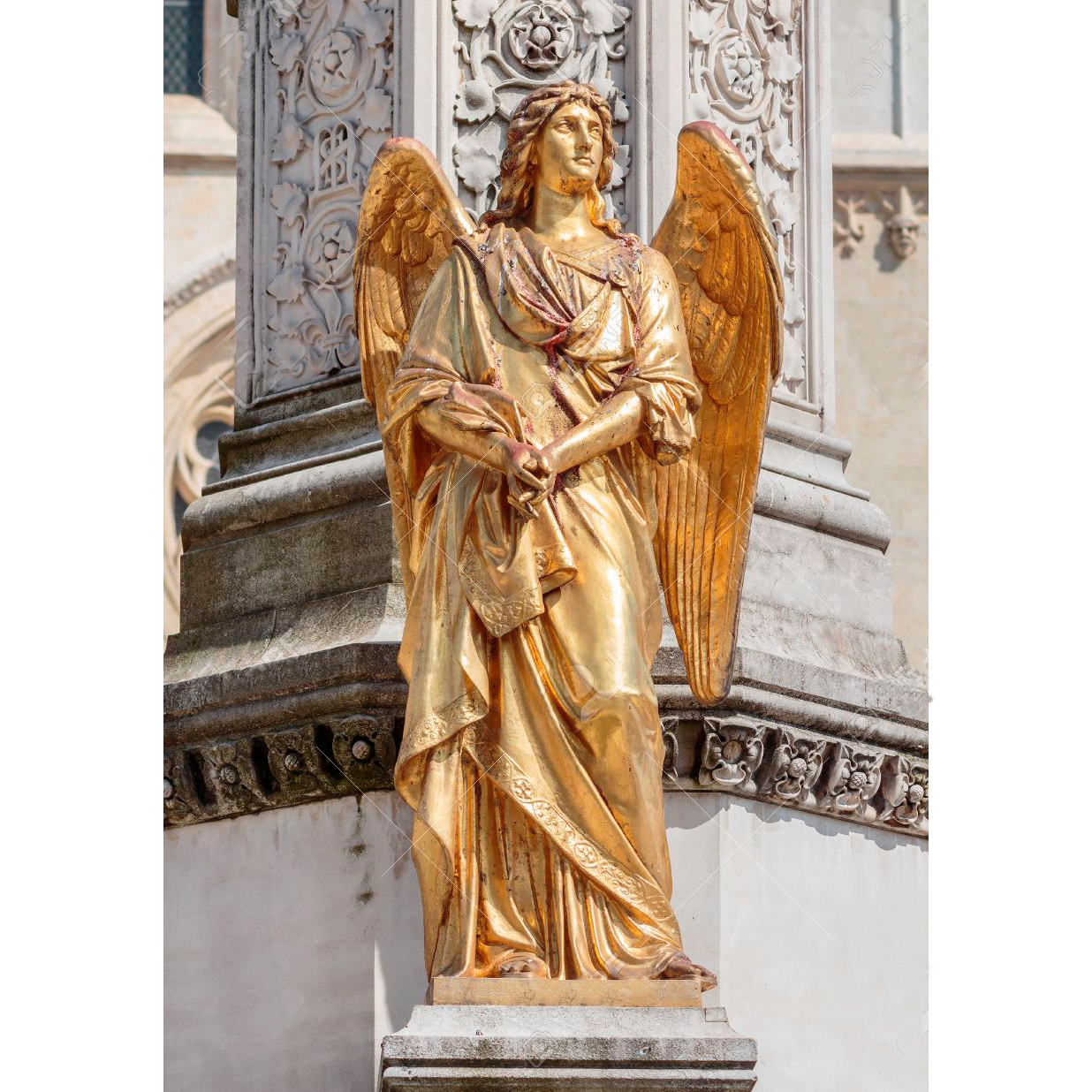 Gold angel sculpture